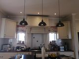 Pendant lighting installation in kitchen